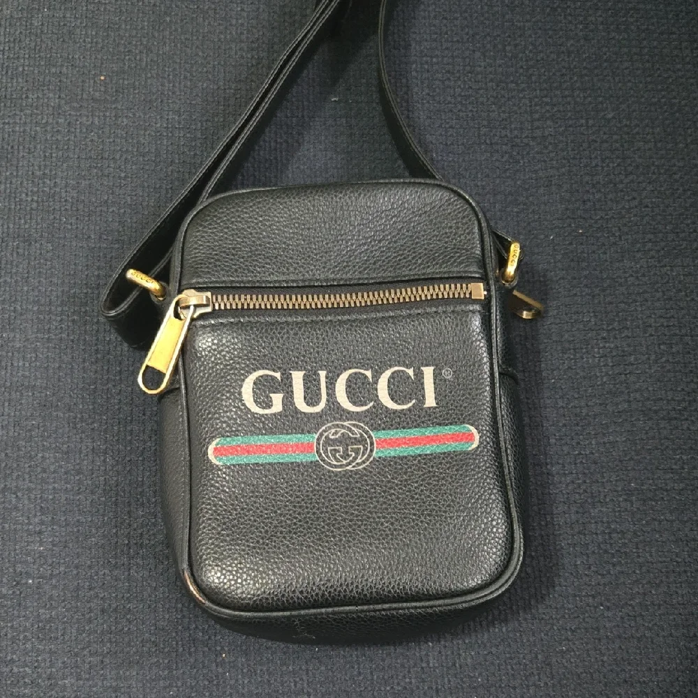 Gucci Black and Gold Messenger Bag with Signature Details